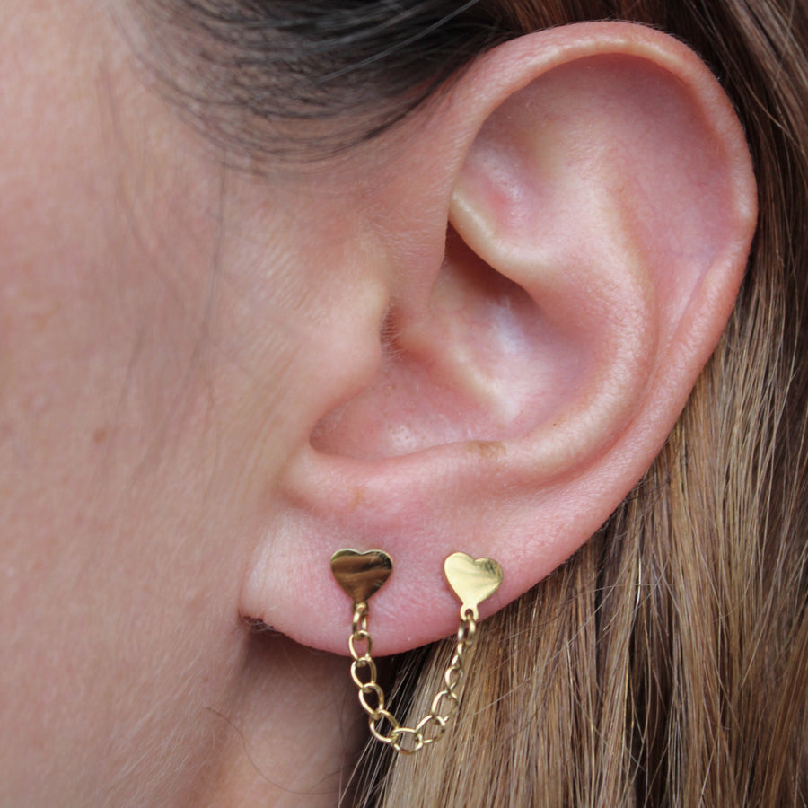 Piercing Doble Cadena Corazones
